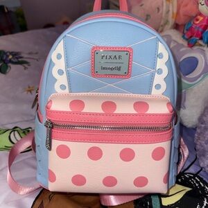 Loungefly Pixar Polka Dot Pink & Light Blue Mini Backpack